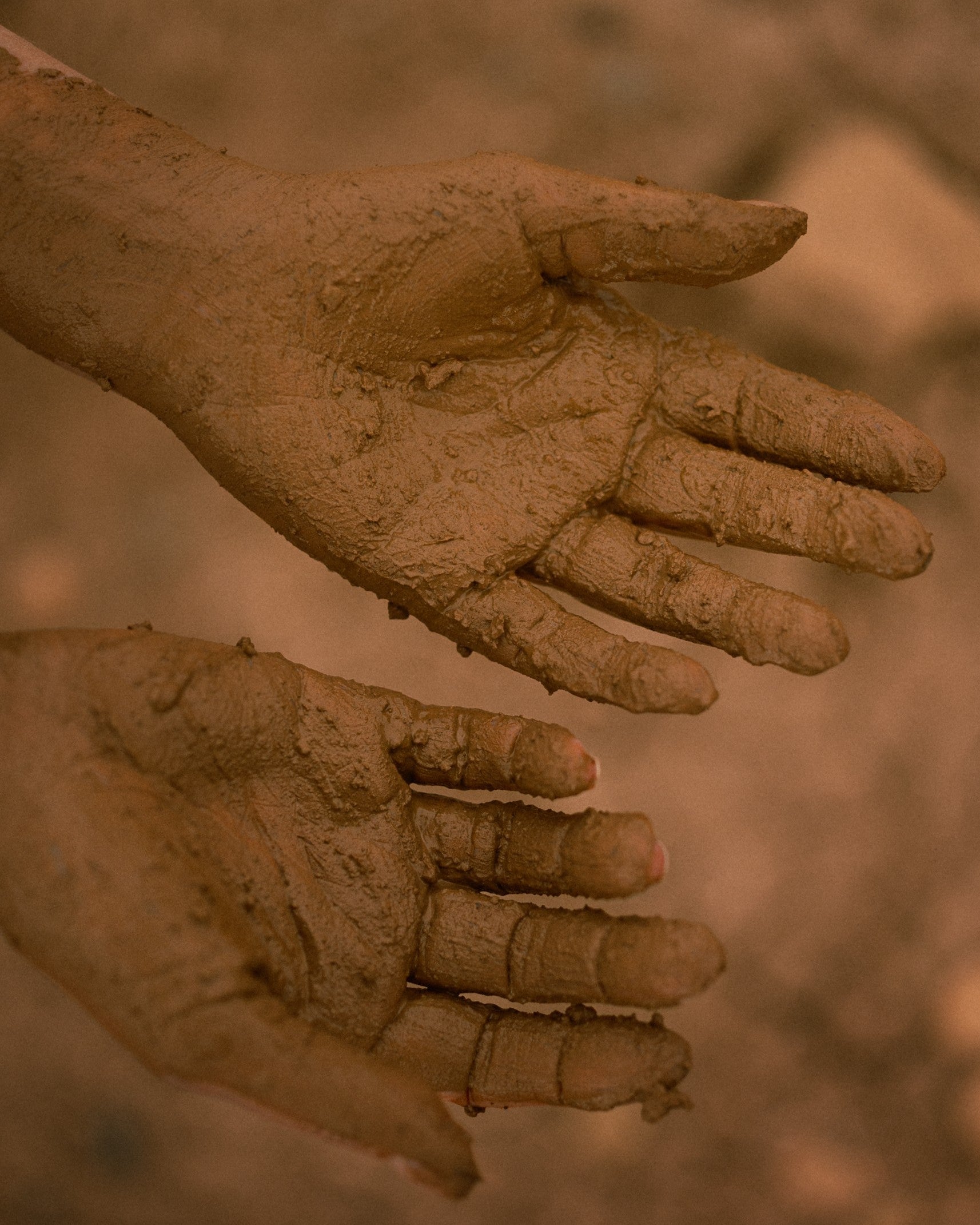Hands in clay